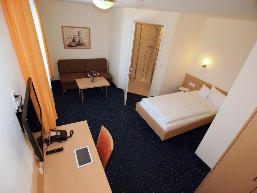 Hotel Gasthof Schuetzen Gbr Лаупхайм Номер фото